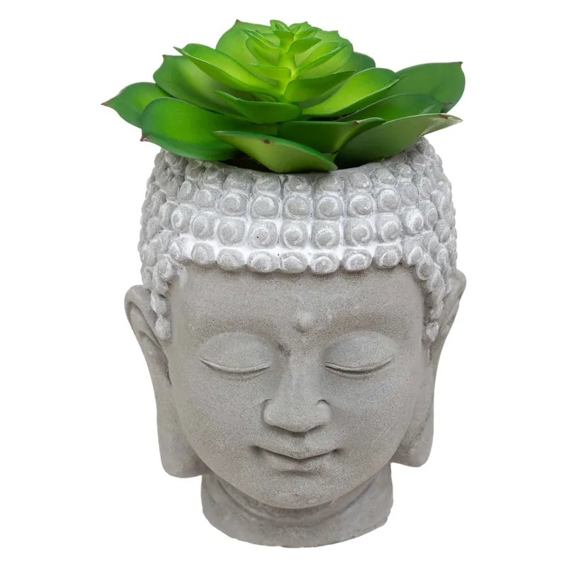 Testa Buddha con candela